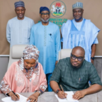 Nigerian officials signing mining investment agreement