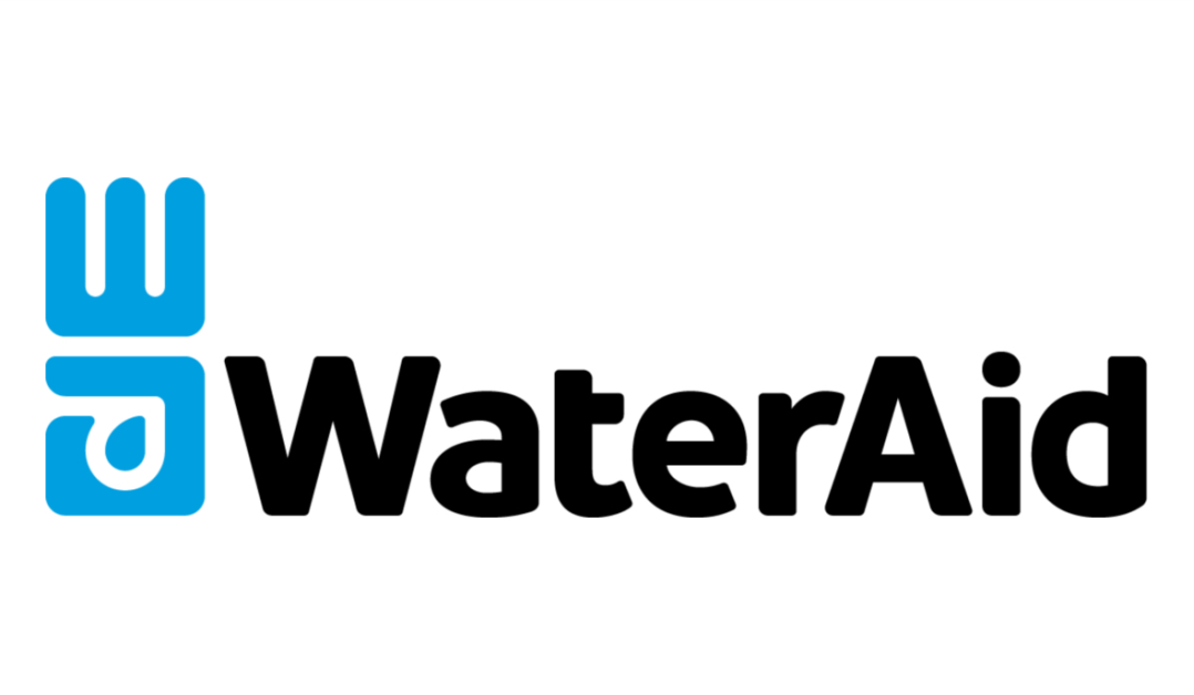 Community members accessing clean water from borehole under WaterAid WASH project in Abuja