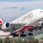 An Emirates aircraft prepares for takeoff as the airline resumes Dubai–Lagos flight operations after regional disruptions.