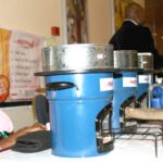 Women in Kaduna receive clean cookstoves to reduce pollution and firewood use.