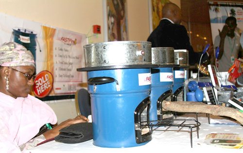 Women in Kaduna receive clean cookstoves to reduce pollution and firewood use.