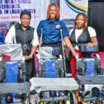 Civil servants with disabilities receiving assistive tools in Lagos