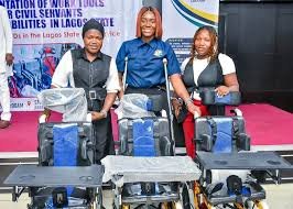 Civil servants with disabilities receiving assistive tools in Lagos
