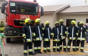 Fire service officials advising residents on safety measures