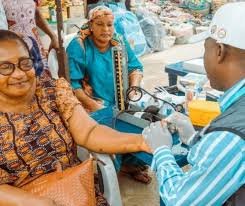 Health workers educating market women during Osun Women’s Day outreach