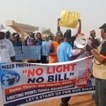 Minna residents protest electricity outages and estimated billing by AEDC