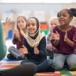 Muslim school children attending classes during Ramadan after early morning fasting meal
