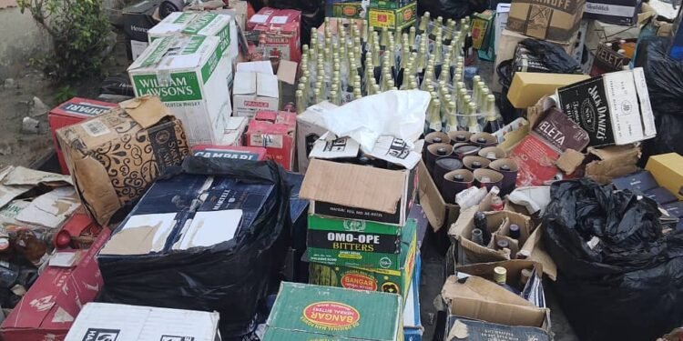 Seized counterfeit alcoholic drinks displayed during NAFDAC raid in Lagos