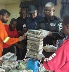 NDLEA officers displaying seized cocaine in Lagos