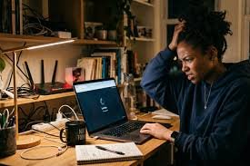 Nigerian student struggling with slow internet connection at night