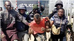 Police officers arresting robbery suspects in Abuja