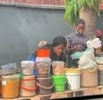 Quiet roadside food stall with no customers in Abuja