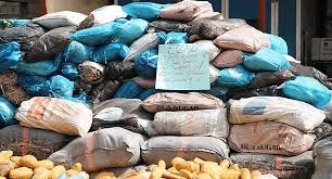 Seized cannabis bags displayed by NDLEA operatives