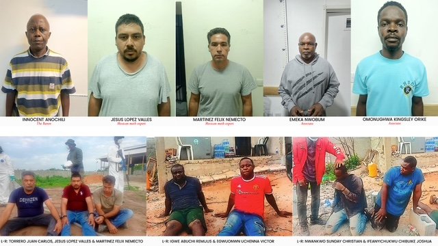 NDLEA operatives displaying seized methamphetamine chemicals during cartel raid