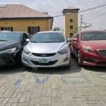 Recovered stolen vehicles displayed by Kano State Police Command after syndicate bust