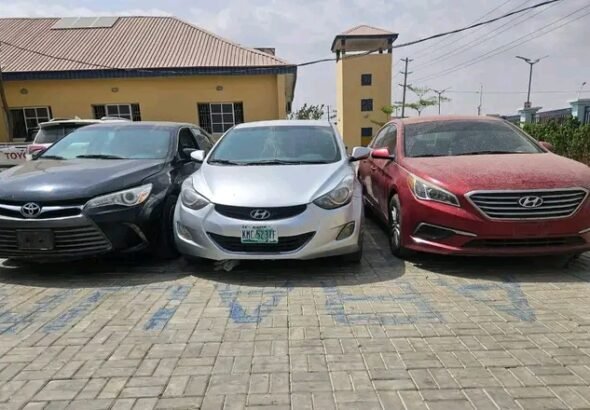Recovered stolen vehicles displayed by Kano State Police Command after syndicate bust