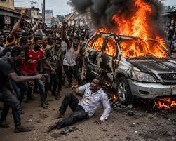 Burnt Lexus SUV after mob attacks US-based Nigerian doctor in Ibadan over false kidnapping allegation.