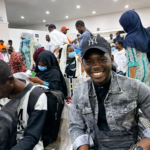 Nigerian evacuees arriving home after being rescued from Sudan conflict zones.