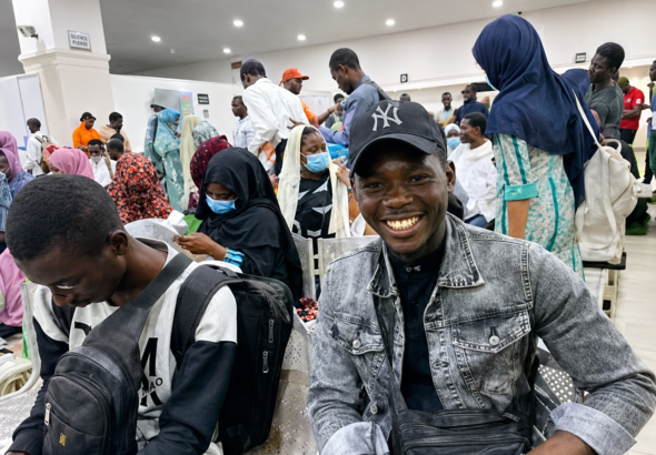Nigerian evacuees arriving home after being rescued from Sudan conflict zones.