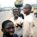 children hawking on the street