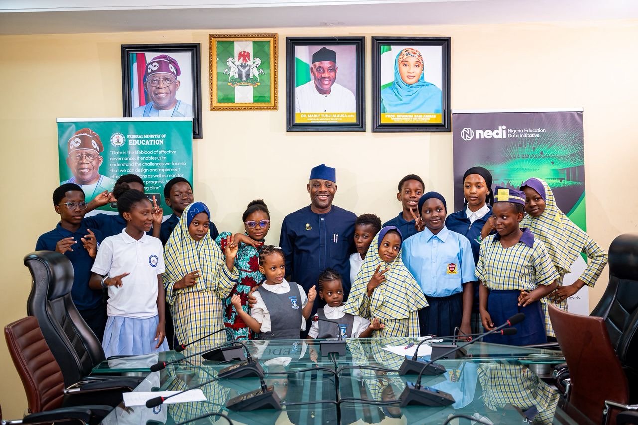 Education Minister Maruf Alausa celebrating Children’s Day with children and disability advocate Dera Osadebe in Abuja