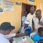 Doctors attending to patients during NAS outreach in Abuja