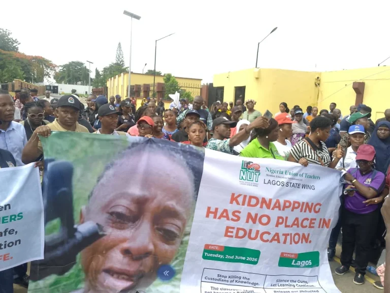 Lagos teachers marching to the State House of Assembly to demand the rescue of abducted pupils and teachers.