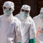 Health officials conducting Ebola awareness campaigns in Lagos communities.
