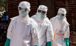 Health officials conducting Ebola awareness campaigns in Lagos communities.