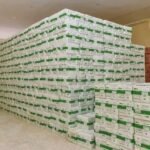 Health officials receiving therapeutic food supplies for malnourished children in Gombe State.