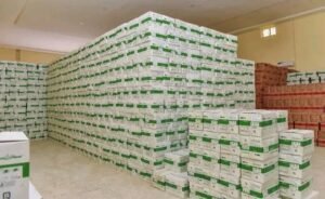 Health officials receiving therapeutic food supplies for malnourished children in Gombe State.