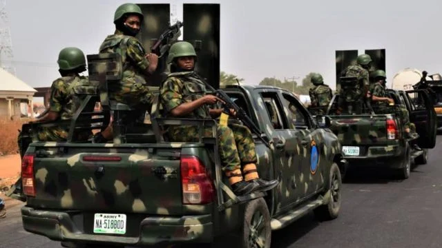 Nigerian Army recruits participating in military training exercises.