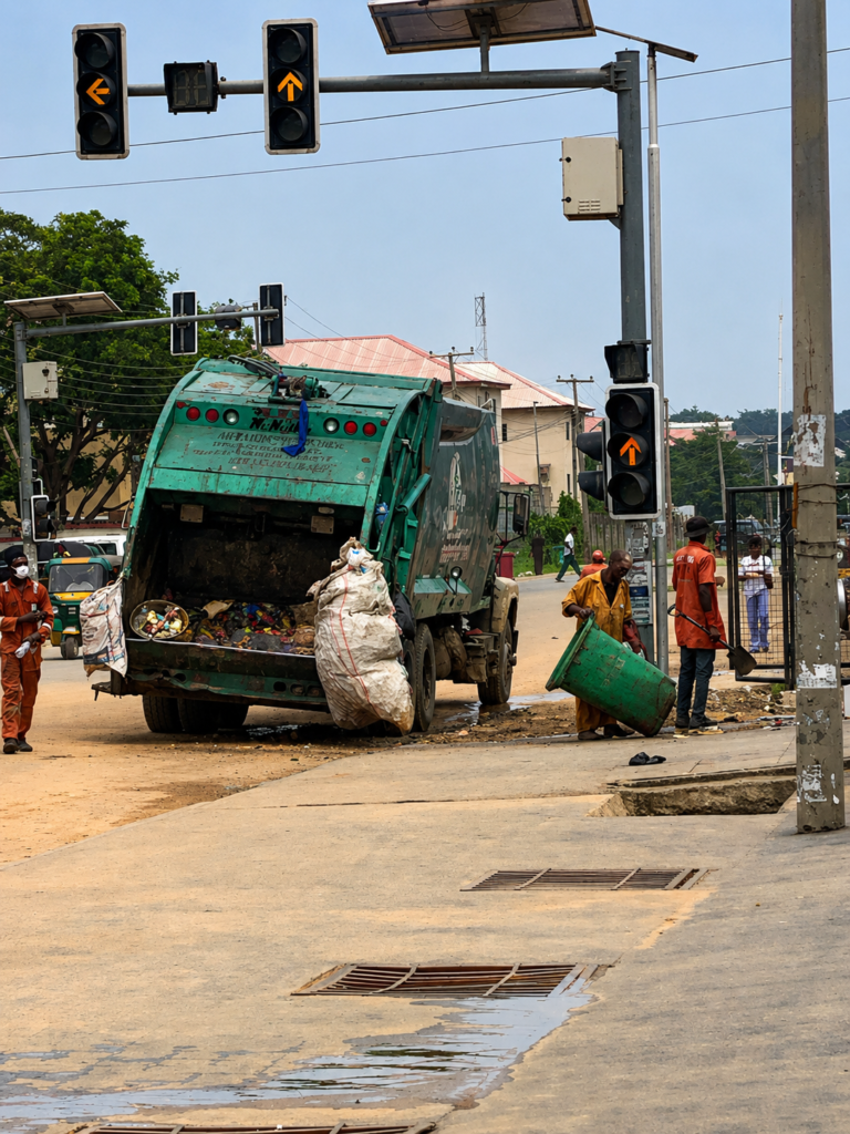 Waste disposal worker Hassan shares his experience of occupational health risks and healthcare challenges during an interview in Gwarinpa, Abuja.