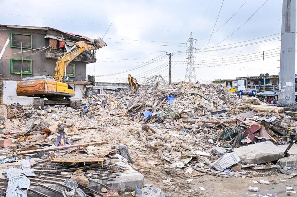 Emergency workers at the scene of the Alakija building collapse in Lagos.