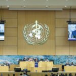World Health Organization headquarters and digital health policy concept illustrating AI governance.