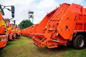 Newly commissioned waste compactor trucks for Lagos waste management operations.