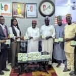 Officials of Swipha Pharma presenting anti-malaria drugs to Kano DMCSA