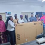 Officials unveiling the Monitoring Smart Boards Dashboard for basic education administration in Abuja.