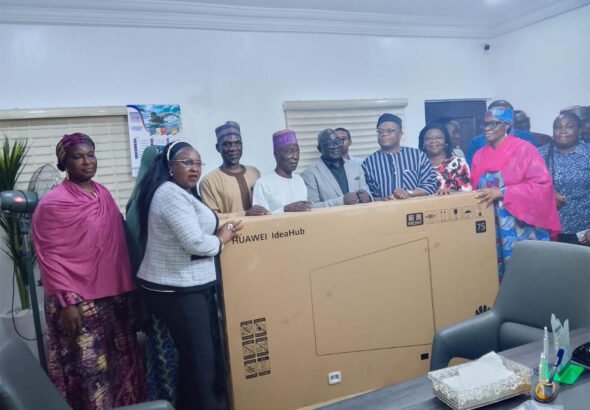 Officials unveiling the Monitoring Smart Boards Dashboard for basic education administration in Abuja.
