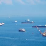Oil tankers navigating the Strait of Hormuz amid heightened tensions.