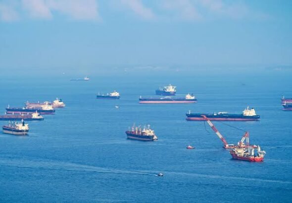 Oil tankers navigating the Strait of Hormuz amid heightened tensions.