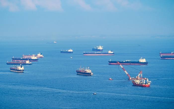 Oil tankers navigating the Strait of Hormuz amid heightened tensions.