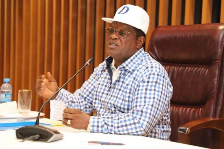 Works Minister David Umahi inspects the Kuramo Lagoon during a flood control assessment in Lagos.