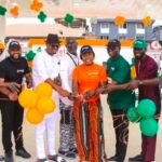 A customer uses Nigeria's first self-service fuel station launched by Sunbeth Energies in Lagos.