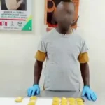 NDLEA officers at Lagos airport after intercepting a suspected drug courier.