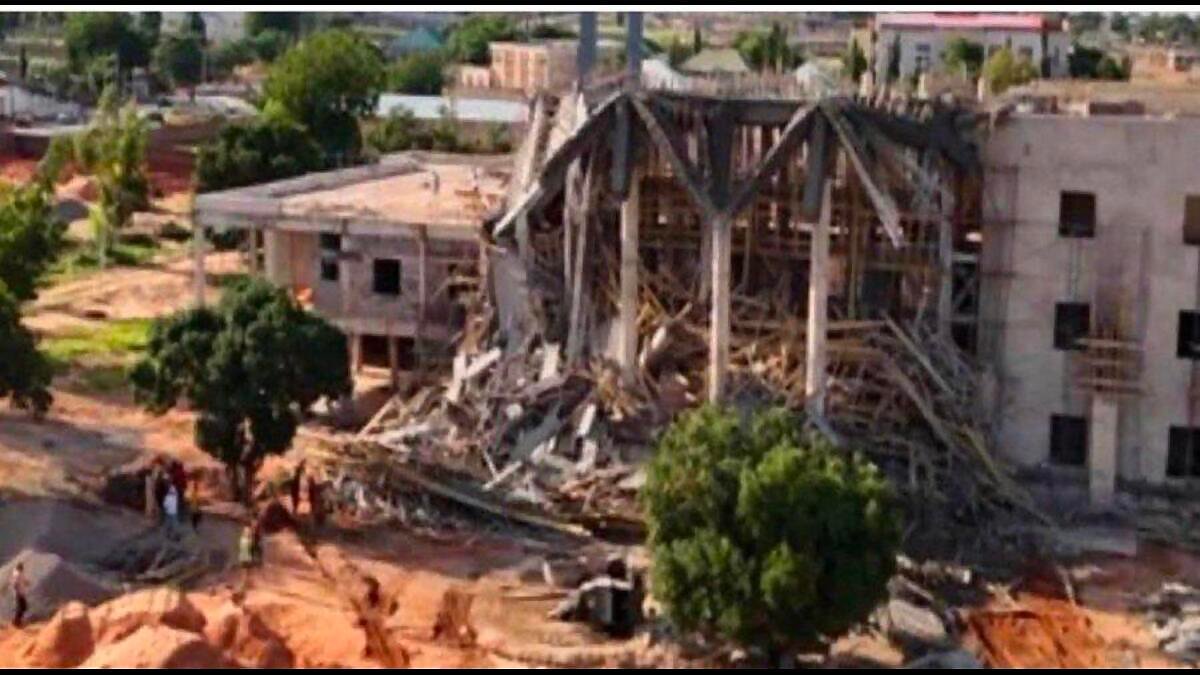 Emergency responders at the collapsed entrance canopy of the new Gombe State House of Assembly complex.