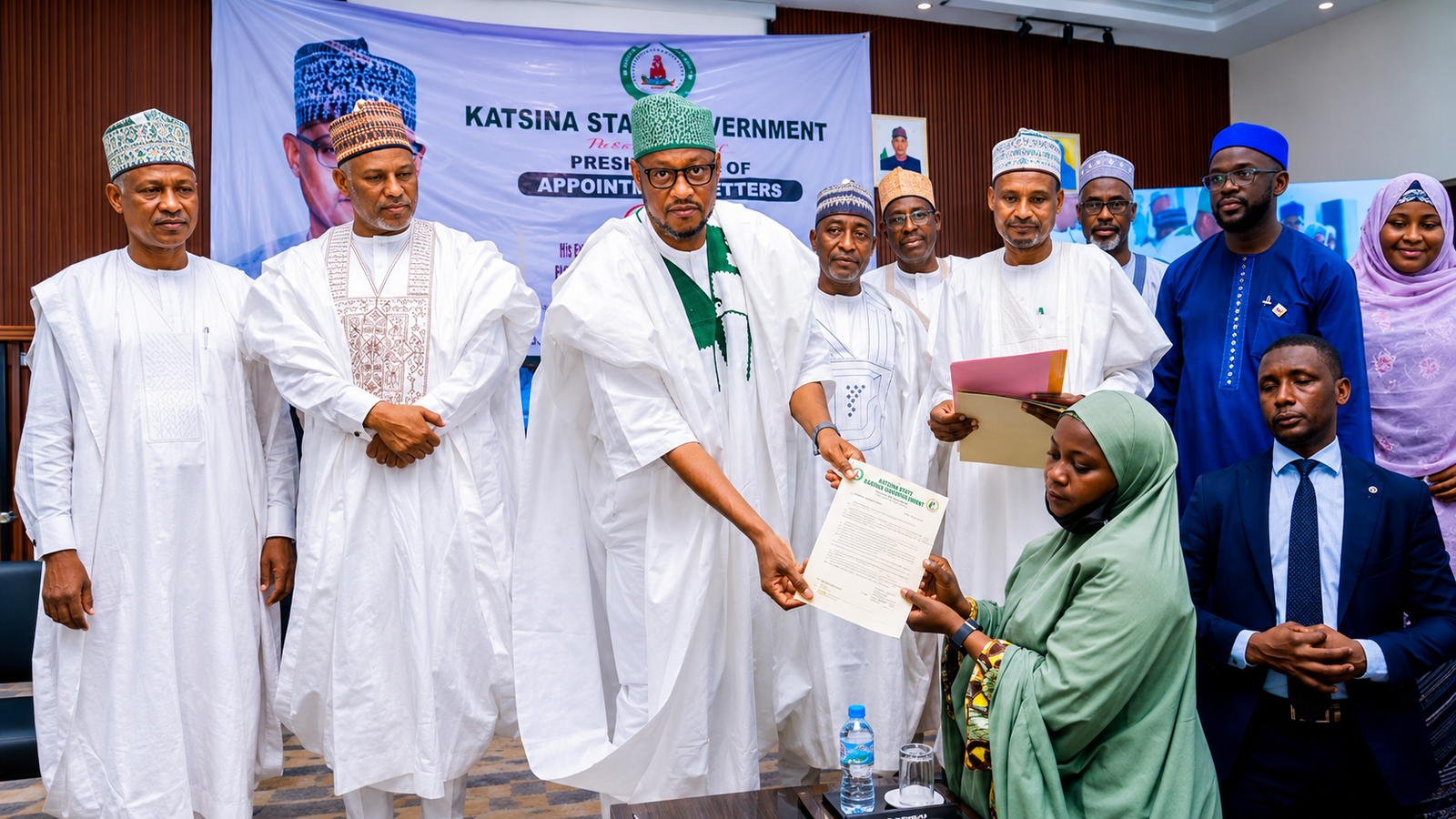 Katsina State Governor Dikko Umaru Radda presents appointment letters to newly recruited teachers during a ceremony in Katsina.
