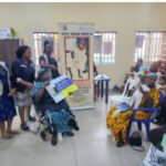 Health workers vaccinate children during immunisation outreach in Edo State.