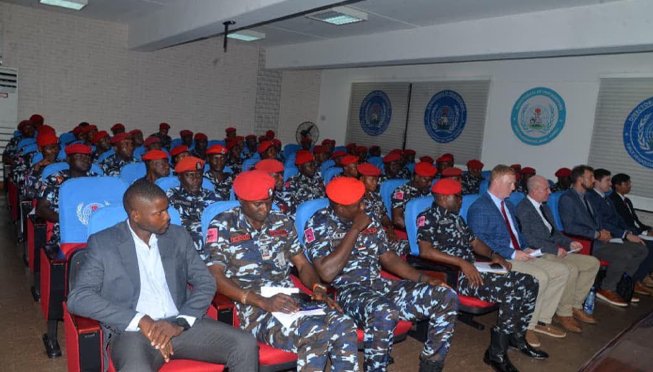 Nigeria Police officers receive certificates after British-backed counter-terrorism training in Abuja.