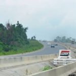 Traffic moves along the Kara Bridge on the Lagos-Ibadan Expressway during repair preparations.